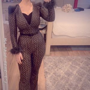 Nadine Merabi designer jumpsuit size small black colored